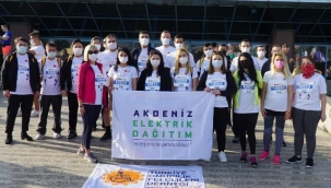 AEDAŞ çalışanları, Runatolia Maratonu'nda omurilik felçlilerinin 'yol arkadaşı oldu'