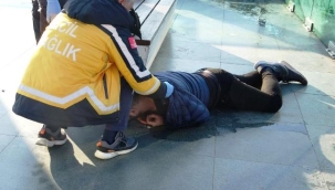 Alkol alıp betonda sızan adamı uyandırmak kolay olmadı