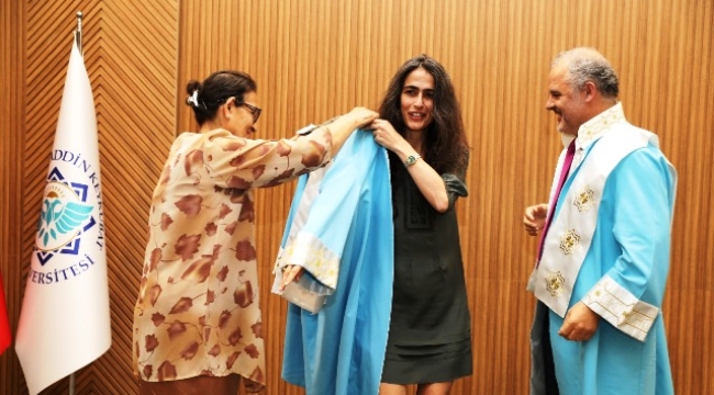 ALKÜ'de akademisyenler onurlandırıldı