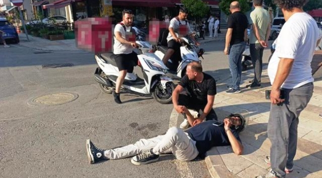 Başını kaldırıma çarptı, kask sayesinde kazayı ucuz atlattı