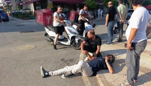 Başını kaldırıma çarptı, kask sayesinde kazayı ucuz atlattı