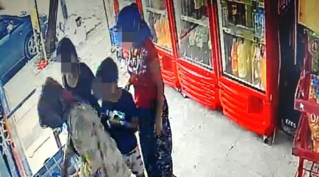 Marketten dondurma ve içecekleri çalıp kıyafetlerine gizlediler 