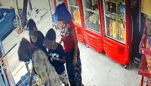 Marketten dondurma ve içecekleri çalıp kıyafetlerine gizlediler 